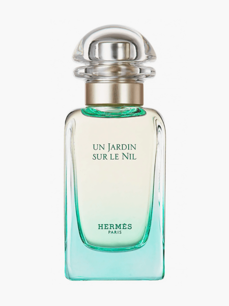 Un Jardin Sur Le Nil in branded gradient bottle with silver and clear cap on light gray background